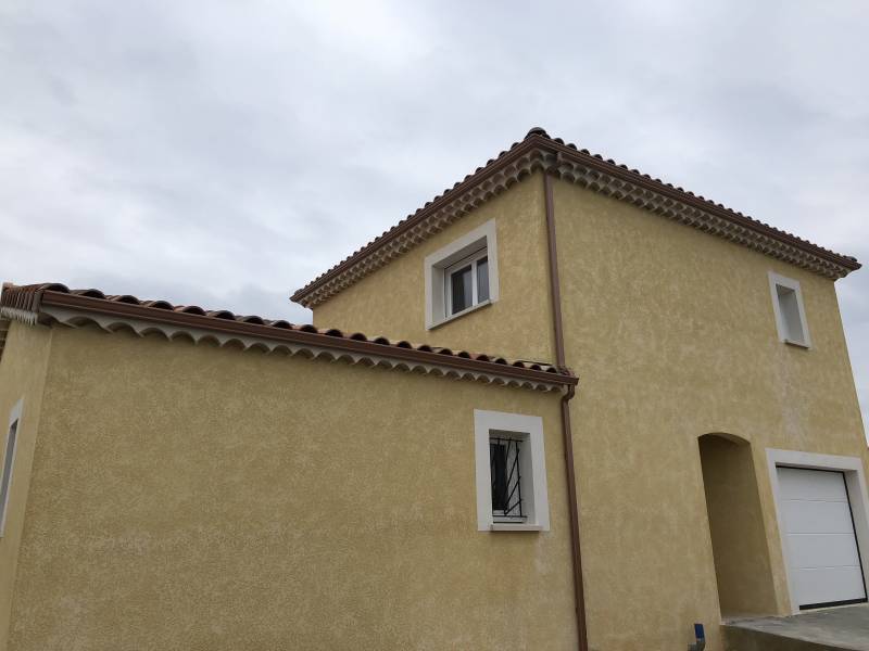 Pose de descentes en aluminium à Caissragues dans le Gard